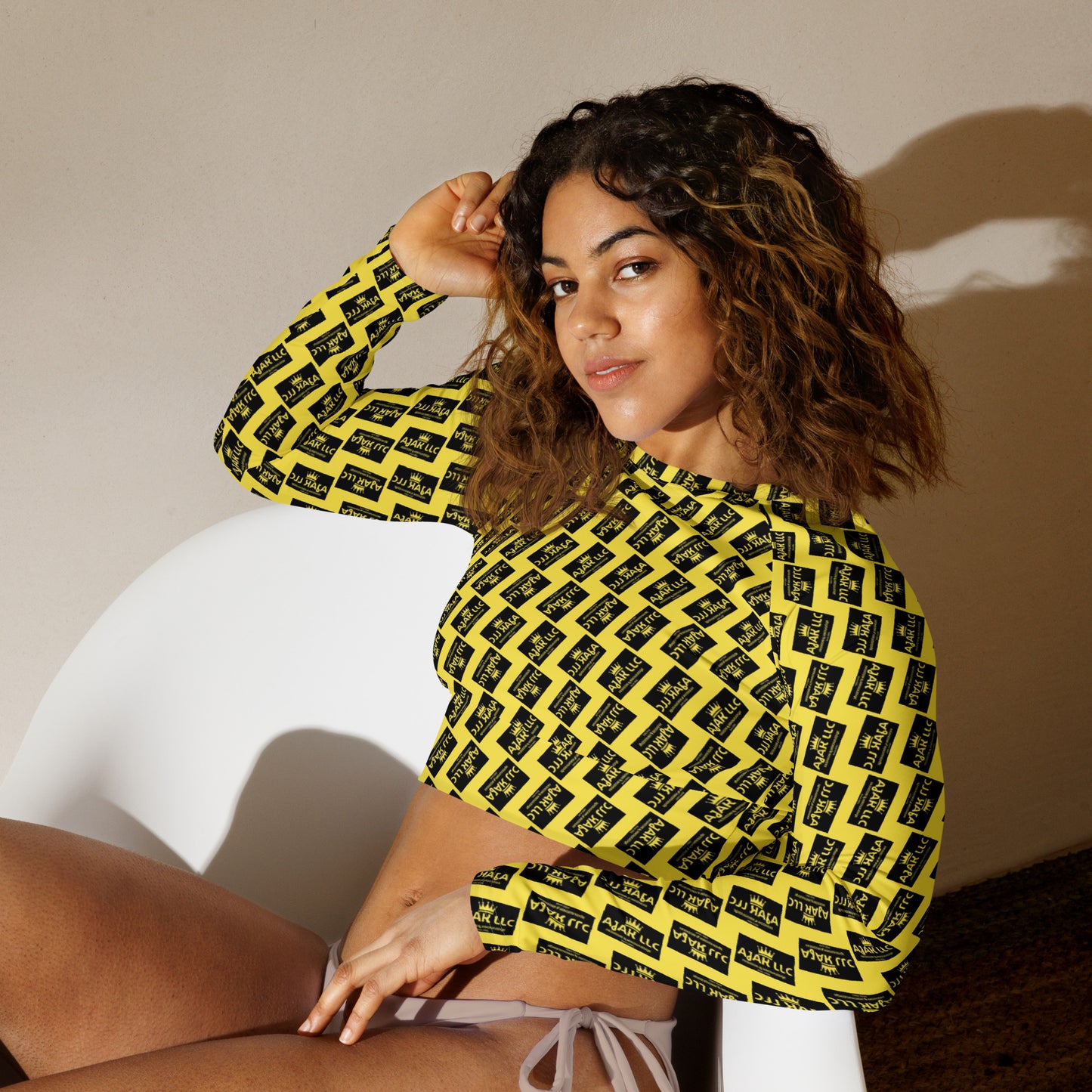 AJAK Exclusive Recycled long-sleeve crop top